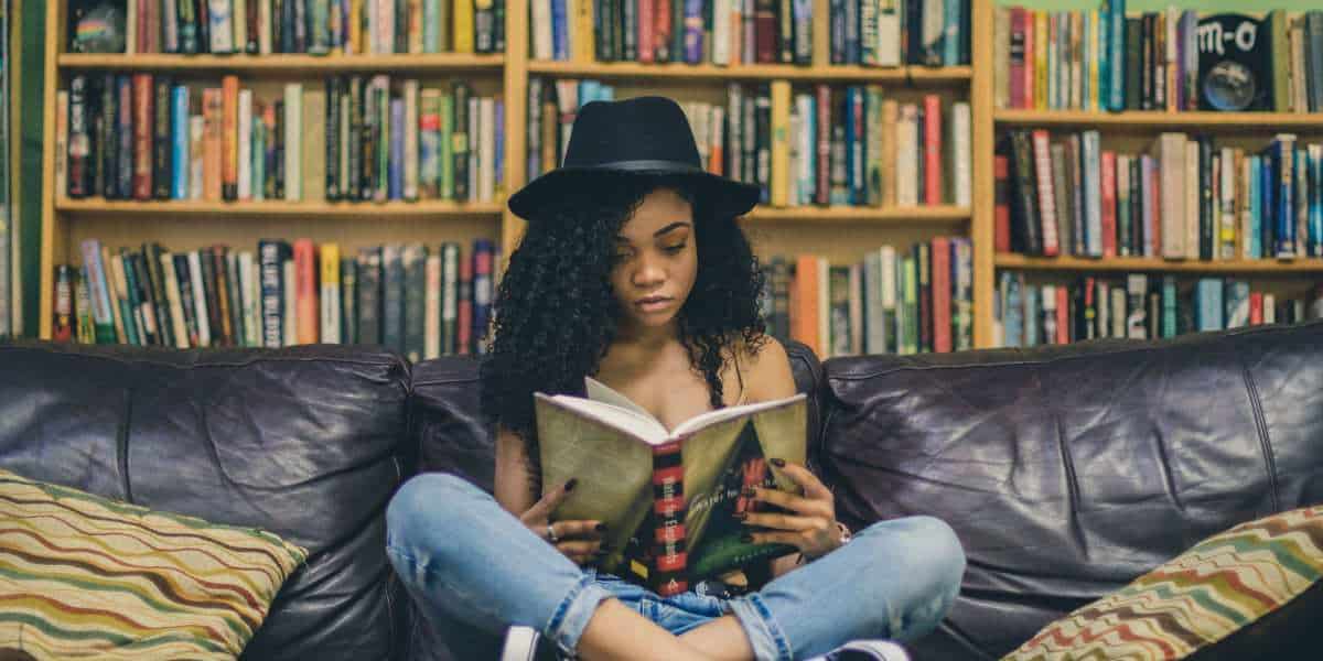 a centered, peaceful teen child spending time reading