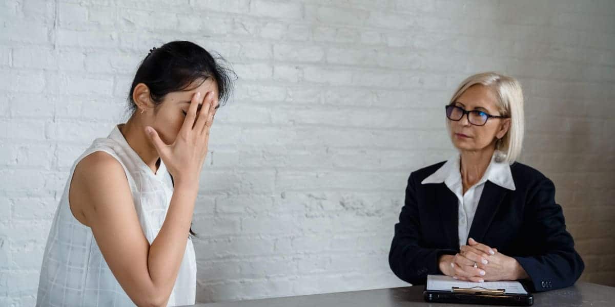 woman working with a divorce attorney